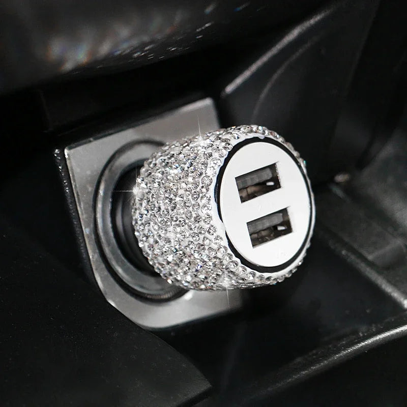 Pink crystal dual USB car charger with 3-in-1 charging cable from Showlu Fashion Store, shown connected to a vehicle's dashboard.