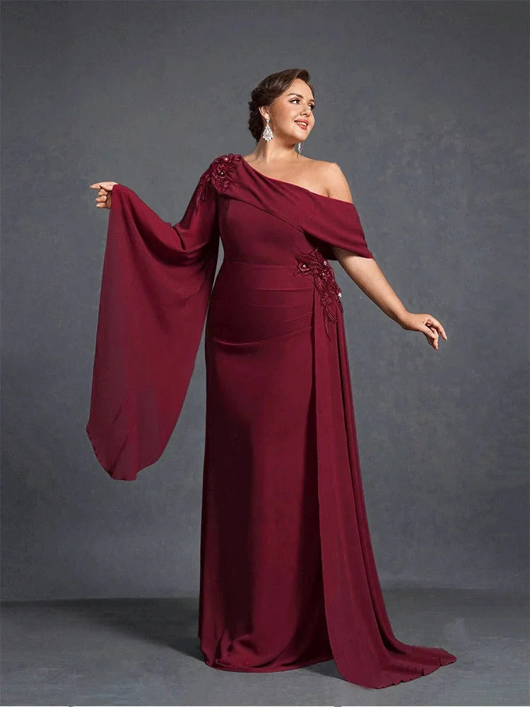 Apricot chiffon plus size strapless floor-length gown by Showlu Fashion, elegant formal dress with flowing silhouette.