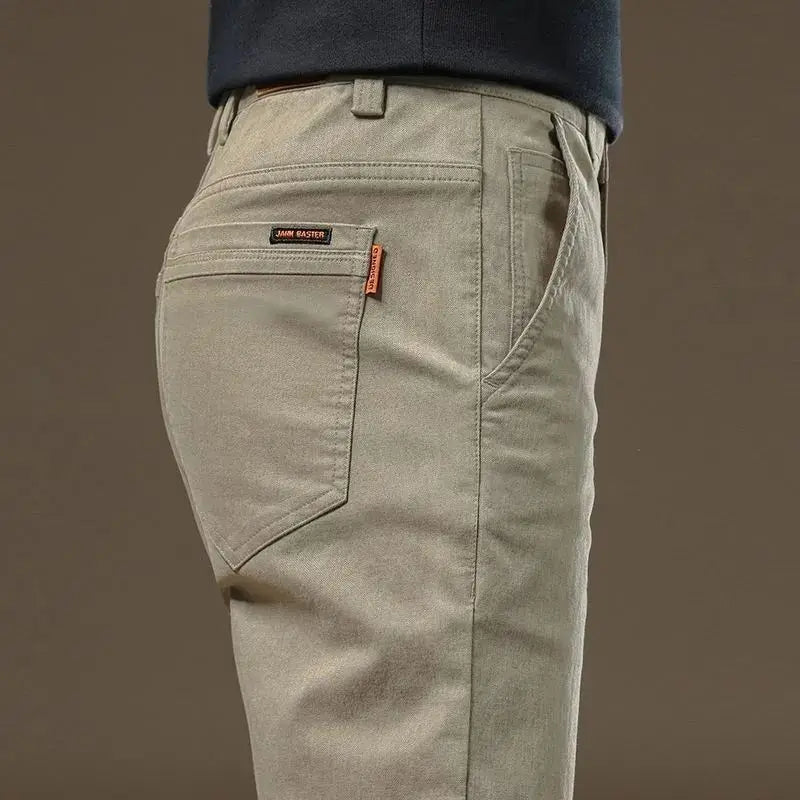 Men's Showlu Slim Straight Cotton Casual Pants, lightweight business trousers, in black, showing front view with pockets and tailored fit.