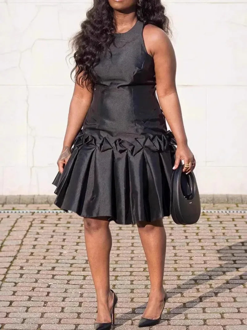 Black sleeveless African dress with traditional dashiki and Ankara fabric, stylish and cultural women’s clothing from Showlu Fashion.