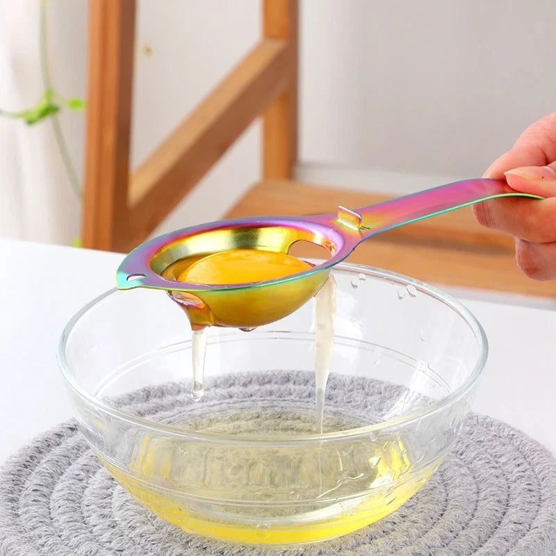 Stainless steel egg separator with handle, Showlu Fashion Store, for separating egg yolks and whites during baking and cooking.