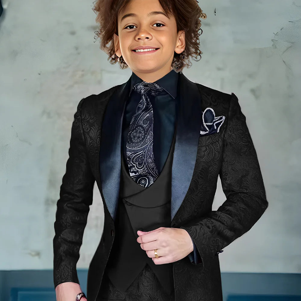 Burgundy jacquard boys 3-piece suit with jacket, pants, and vest, formal tuxedo style for boys, slim fit, perfect for weddings.
