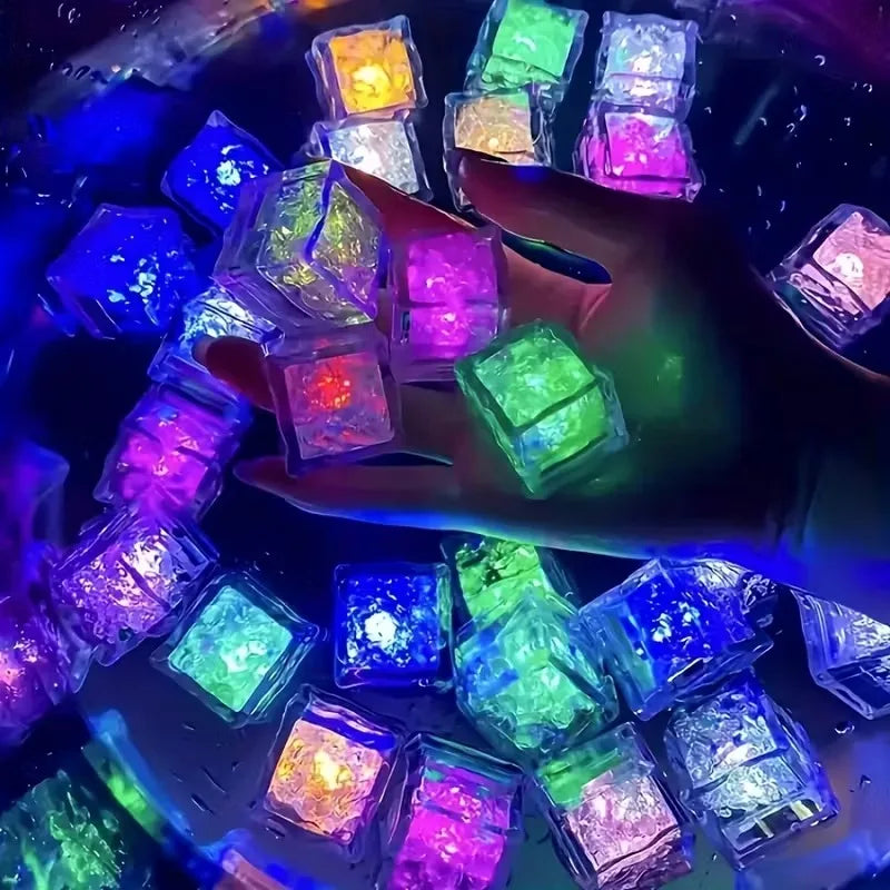 Set of six waterproof LED glowing ice cube lights with liquid sensors, perfect for adding mood lighting to drinks.