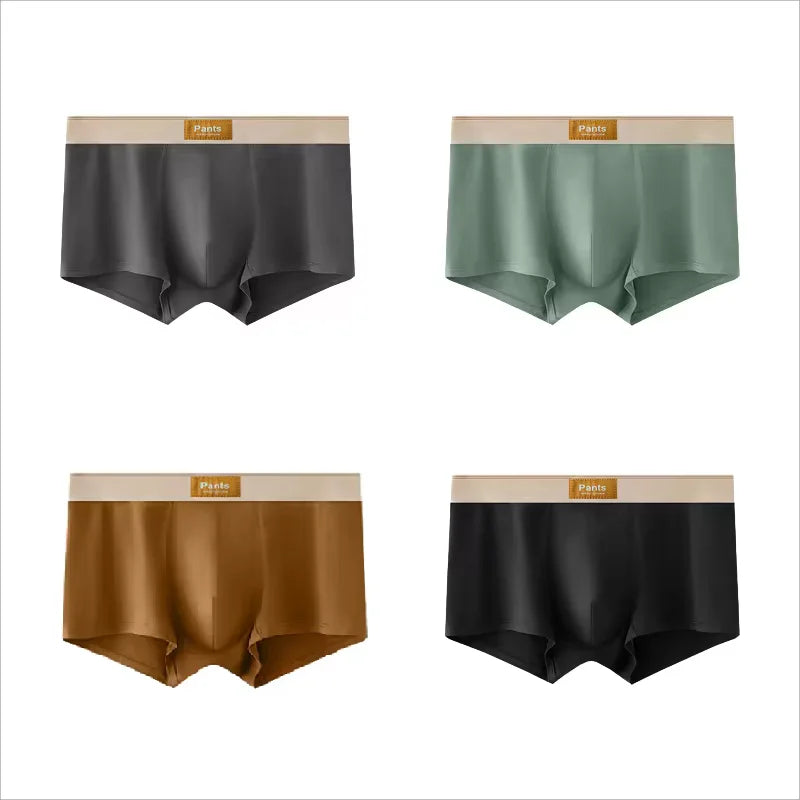Four pairs of men's cotton boxer shorts in large sizes, breathable and comfortable, featuring sporty and sexy designs by Showlu Fashion.