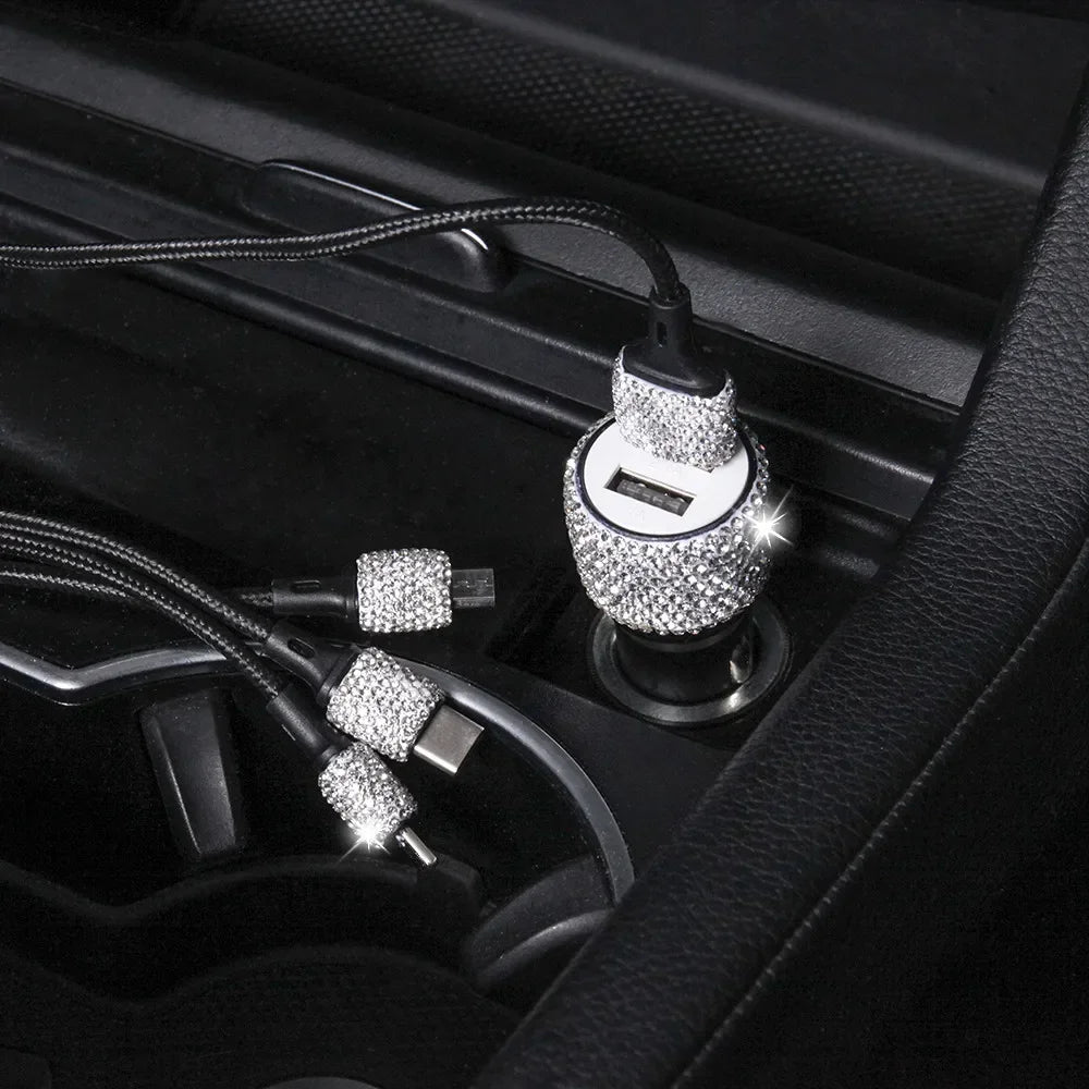 Pink crystal Showlu dual USB car charger with 3-in-1 charging cable, compact and stylish for efficient mobile device charging in vehicles.