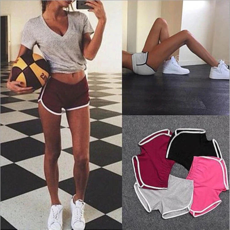 Black SHOWLU Women's high performance yoga shorts designed for gym and running activities, made with breathable, flexible fabric.