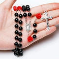 Pink rosary necklace for women with rose glass beads, crucifix cross pendant, and INRI charm, long religious prayer jewelry.
