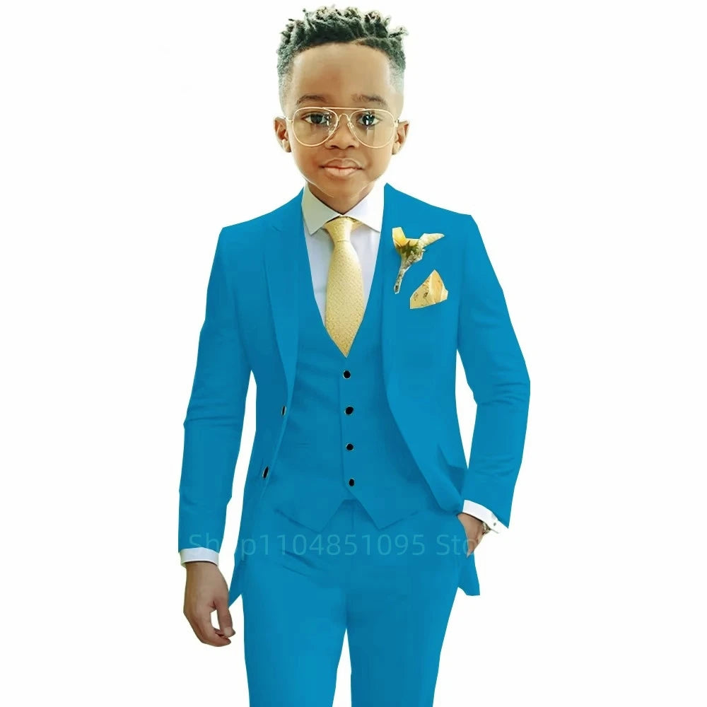 Boy wearing a formal 3-piece suit by 1170uf-he, suitable for weddings and parties, featuring a blazer, vest, and trousers.