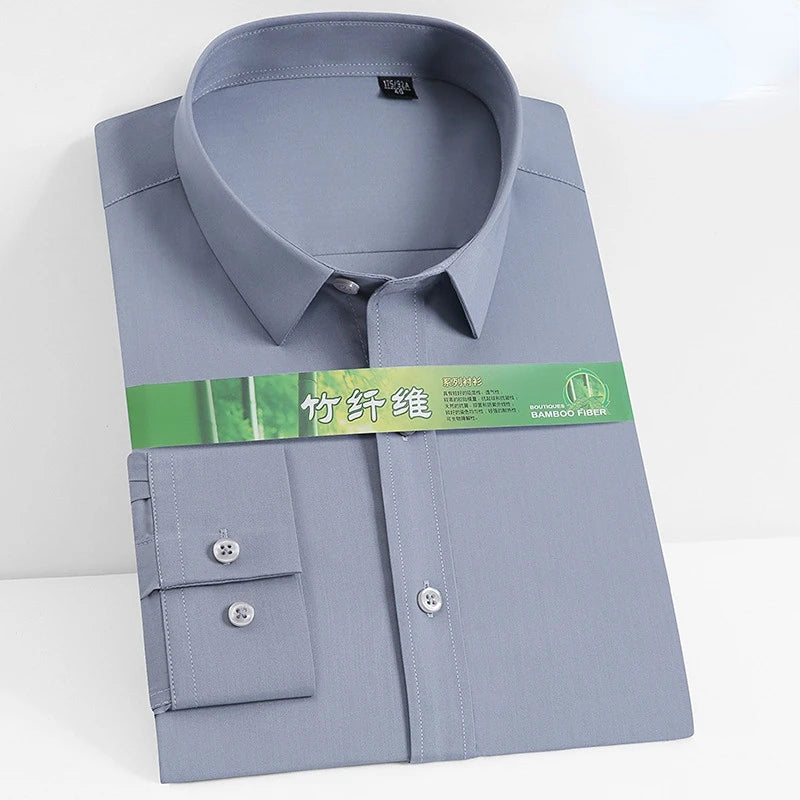 White bamboo fiber men's long sleeve dress shirt from Showlu Fashion, featuring a professional, soft, and stretch-free design in 8XL size.