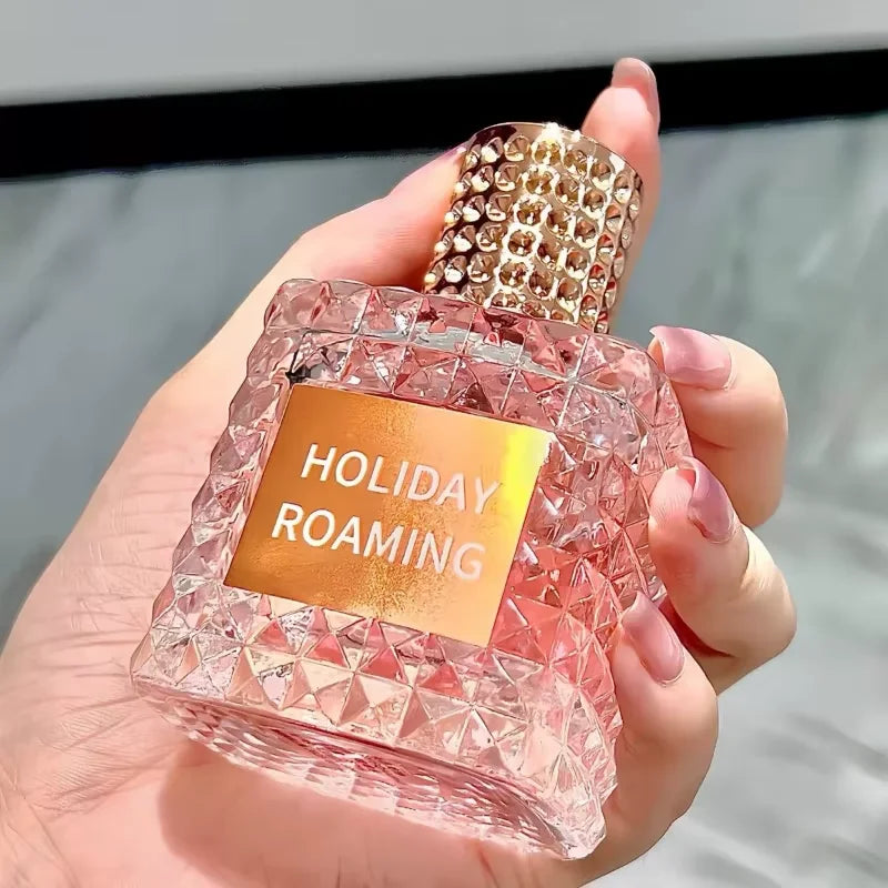 Showlu Fashion DJBS Rivet Series Floral EDT perfume bottle, 100ml long-lasting fragrance with floral design, in sleek packaging.