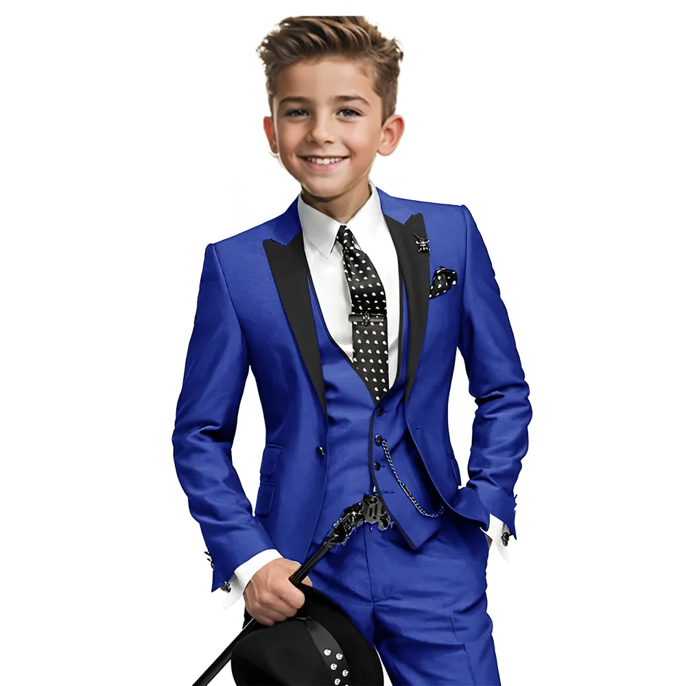 Navy blue boys tuxedo with blazer, vest, and pants from Showlu Fashion Store, formal 3-piece suit for ages 2-16, suitable for weddings.