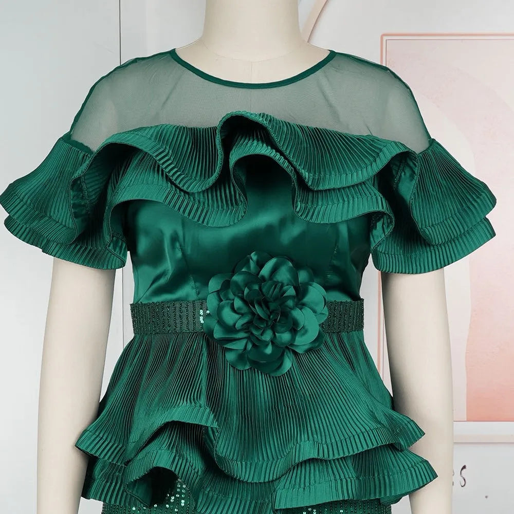 Off-shoulder MD African women's sequin peplum dress, elegant wedding and party gown with shimmering embellishments.