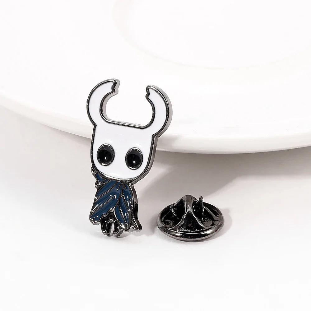 Wannee Hollow Knight enamel pin featuring zinc alloy design, video game badge with intricate detail and vibrant colors.