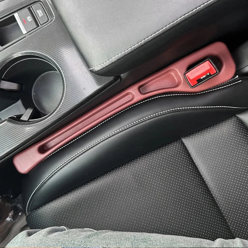 Showlu Smart General car seat gap organizer with multiple compartments for storing essentials between car seats.