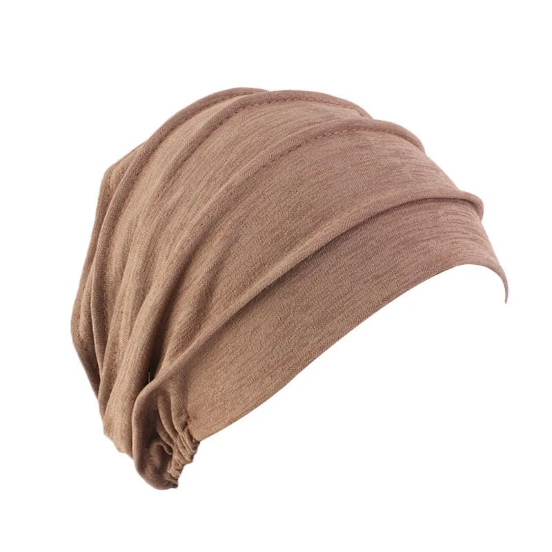Women’s solid color turban beanie by Showlu Fashion with elastic head cap, ideal for cancer hair loss, chemo, or hijab wear