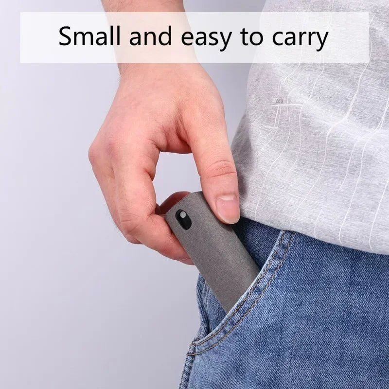 Showlu Fashion Store microfiber screen cleaner spray bottle for mobile phones, tablets, and laptops with press spray mechanism.