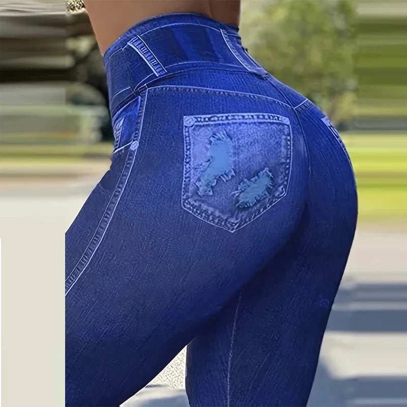 High-waist skinny leggings with ripped details from Showlu Fashion Store, comfortable polyester, versatile for all seasons.