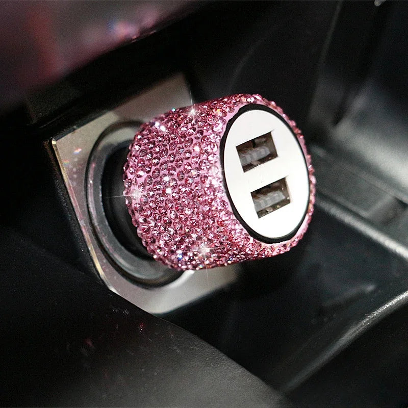 Pink Showlu Crystal Dual USB Car Charger with 3-in-1 charging cable, compact design and sparkling crystal accents for convenient in-car charging.