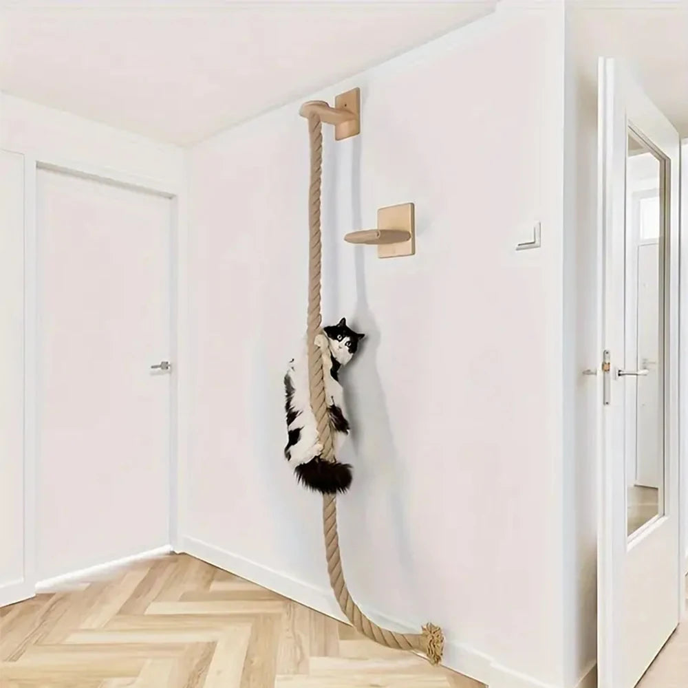 Wall-mounted cat climbing rope and sisal scratching post by Showlu Fashion Store, featuring natural wood and sisal textures.