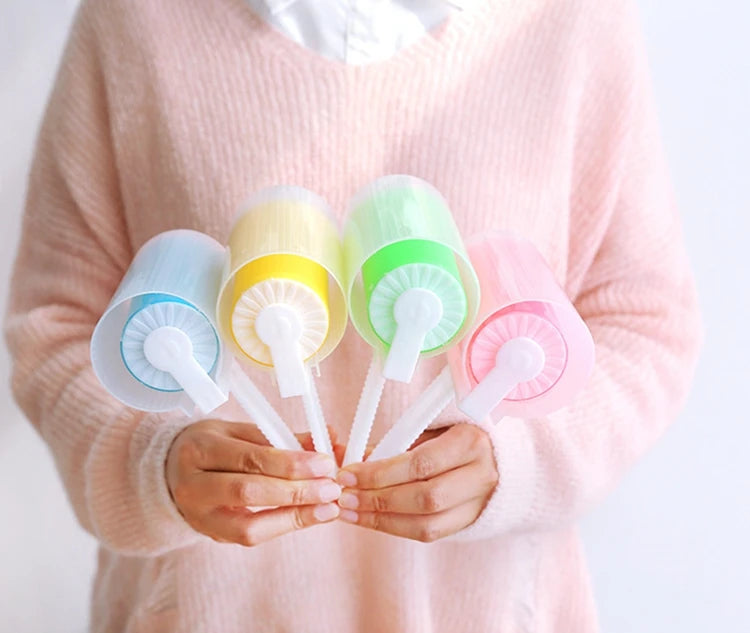 Showlu Smart General Pet Hair Roller Pro cleaning pet hair from furniture and clothing with its compact roller design.