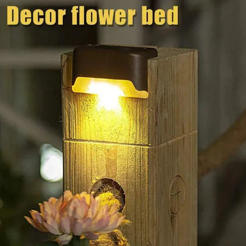 Showlu Smart General solar waterproof deck step lights illuminating outdoor stairs with warm LED light in a nighttime setting.