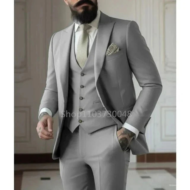 SHOWLU Men's 3-piece slim fit formal suit, cotton wedding tuxedo set with jacket, vest, and trousers, showcased on a hanger.
