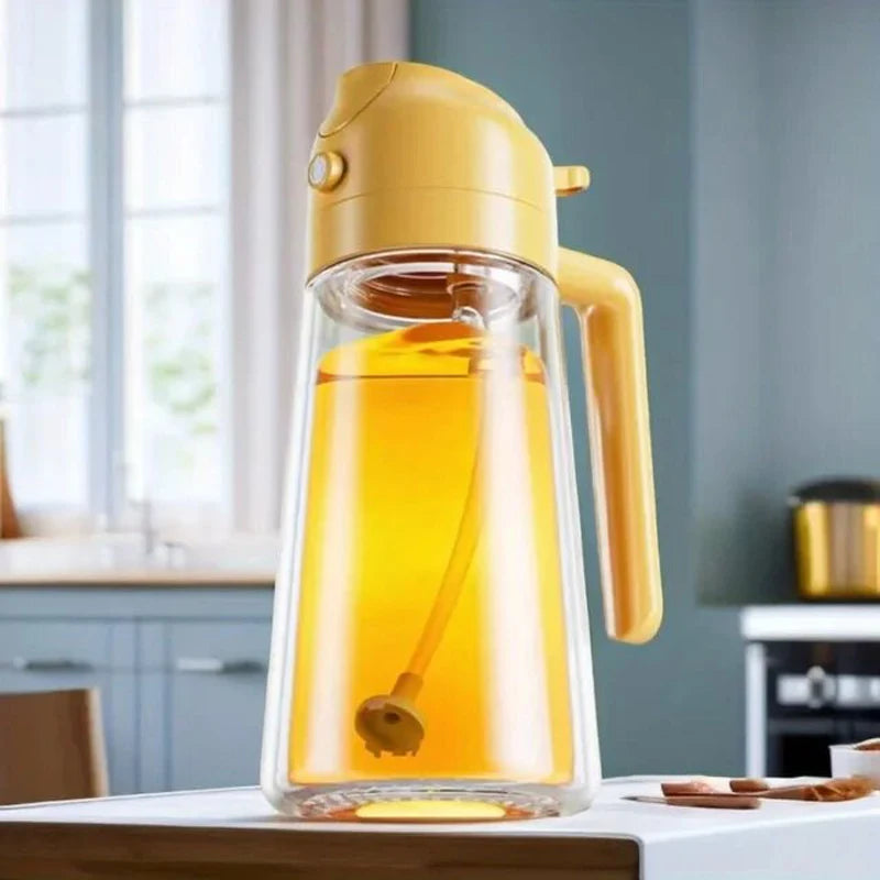 Plastic spray oil dispenser bottle with 2-in-1 design for kitchen, baking, and BBQ use, featuring a 500ml capacity and adjustable spray.