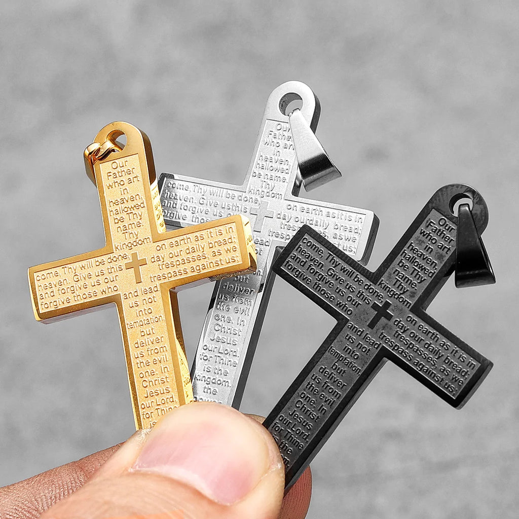 Stainless steel cross pendant necklace with punk-inspired design, featuring religious symbolism, on a chain.