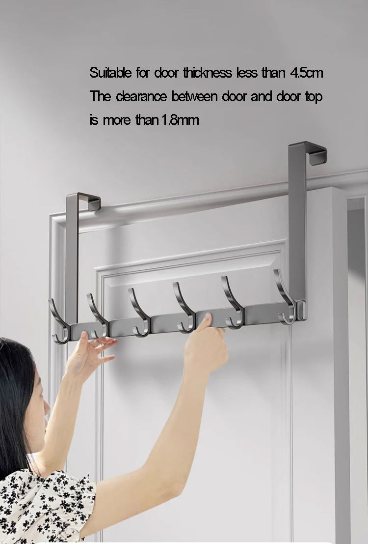 Wall-mounted multi hooks by Showlu Smart General, showing a set of versatile hooks attached to a wall for organization.