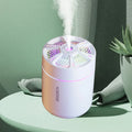 Showlu Smart General Mini USB Humidifier emitting a fine mist, compact design, ideal for desktop or small room use
