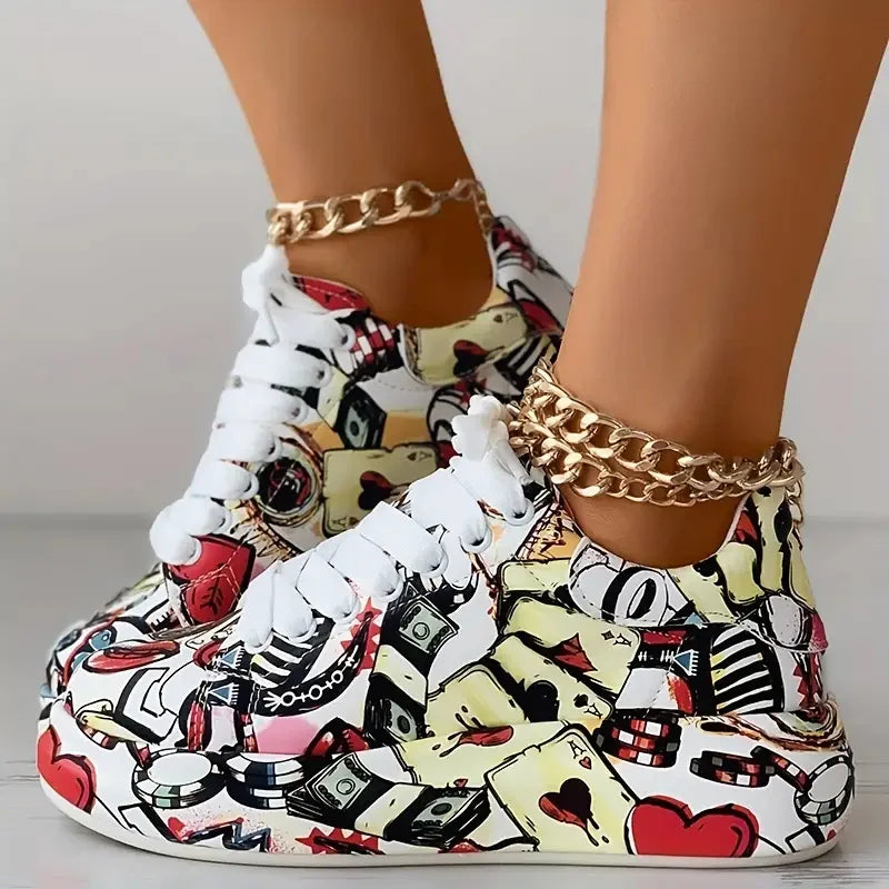Women's thick-soled sneakers featuring a colorful casino-themed graffiti print and white laces.
