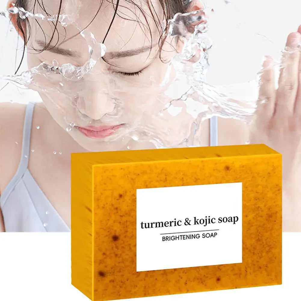 Handmade turmeric and lemon kojic acid soap bar from Showlu Fashion Store, suitable for shower and facial skin care.