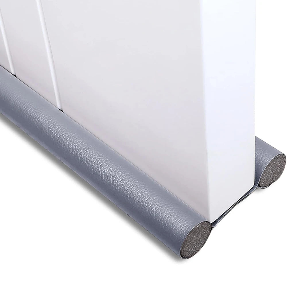 Showlu Smart General anti-dust door seal strip installed on a door to prevent dust and drafts, highlighting its flexible, durable material.