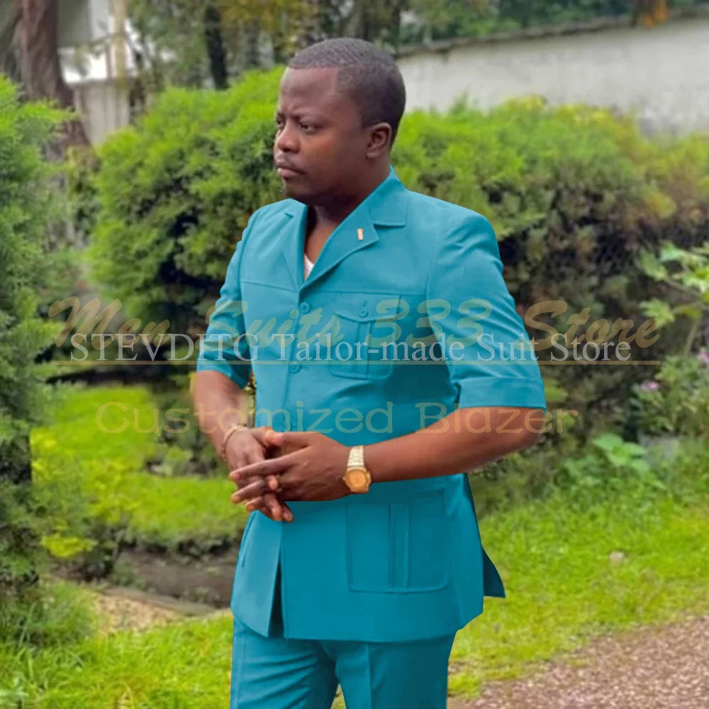 Safari men’s short sleeve suit set by Showlu Fashion, includes single-breasted jacket and matching pants in African fashion style