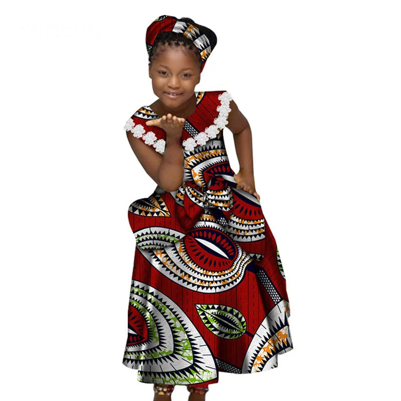 Girls African print mermaid dress by SHOWLU FASHION, made from cotton Bazin Riche dashiki fabric with colorful, vibrant traditional design.