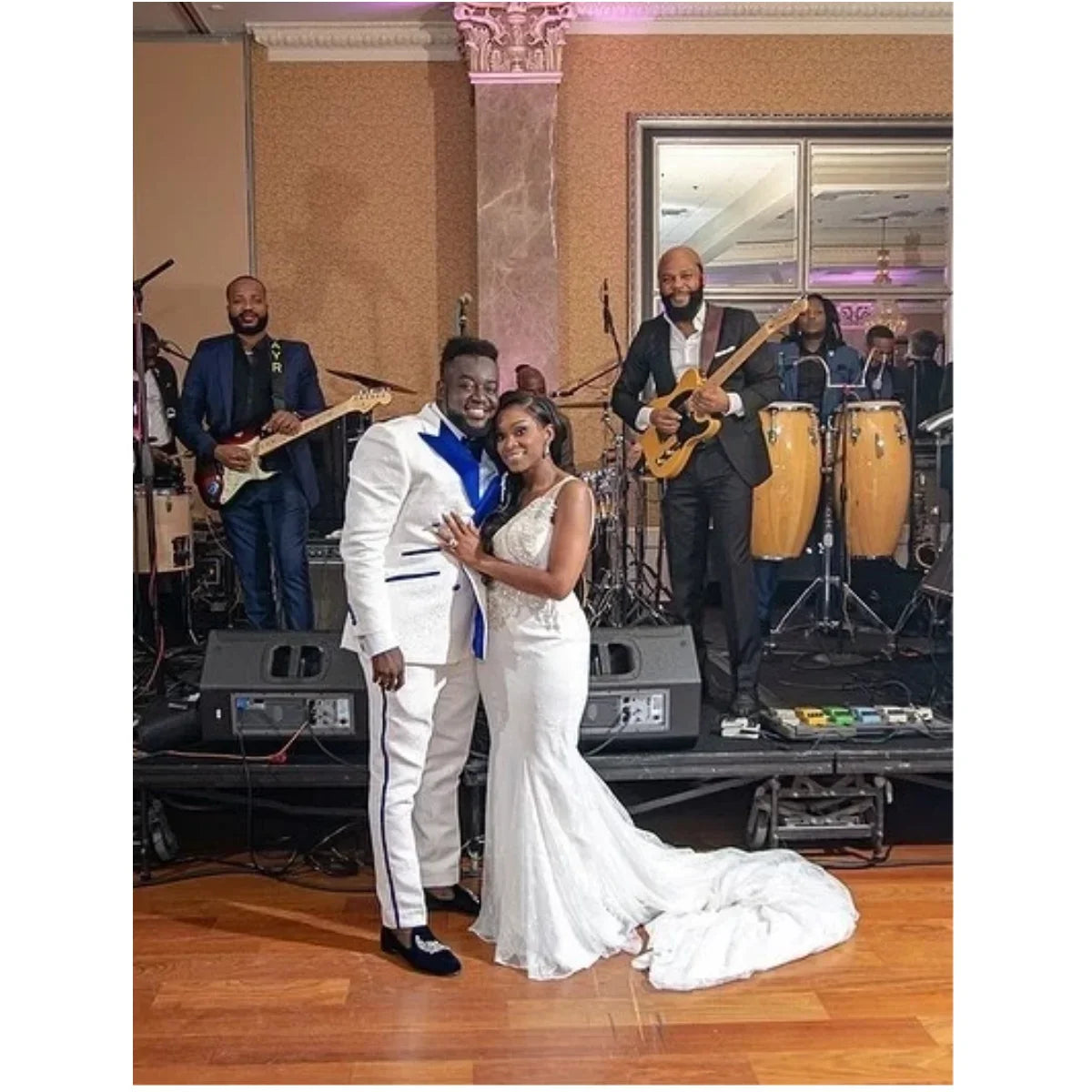 Elegant men's double-breasted floral jacquard wedding tuxedo with slim fit blazer and matching pants, featuring peak lapel and custom fit.