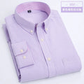 Showlu men's slim fit oxford shirt with long sleeves, non-iron casual dress shirt, in light blue with button-down collar.