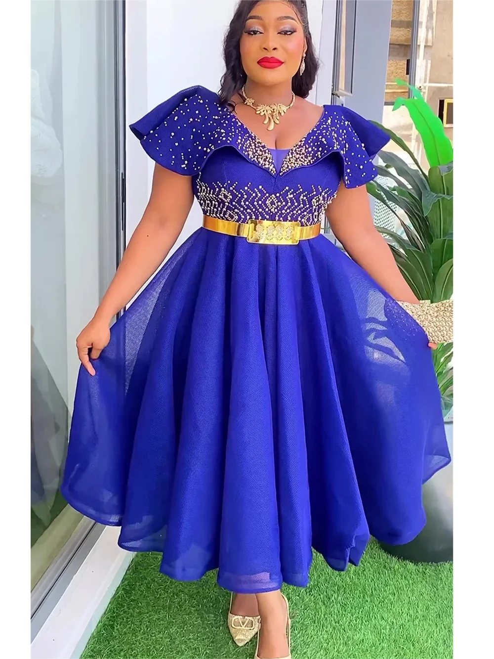Dromiya women's rhinestone A-line evening gown with short sleeves and V-neck, featuring elegant rhinestone embellishments.
