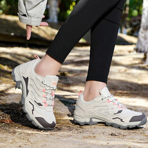 Showlu Fashion Store unisex 2025 hiking shoes with waterproof, non-slip soles, ideal for outdoor sports and camping activities.