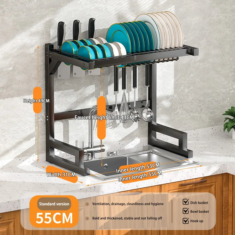 Stainless steel kitchen sink dish drain rack with utensil holder for drying dishes and utensils.