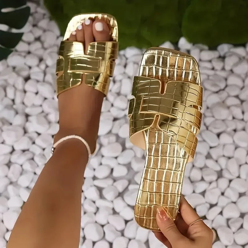 Women's flat gladiator sandals by SHOWLU FASHION, featuring casual summer slip-ons with multiple straps and open toe design.