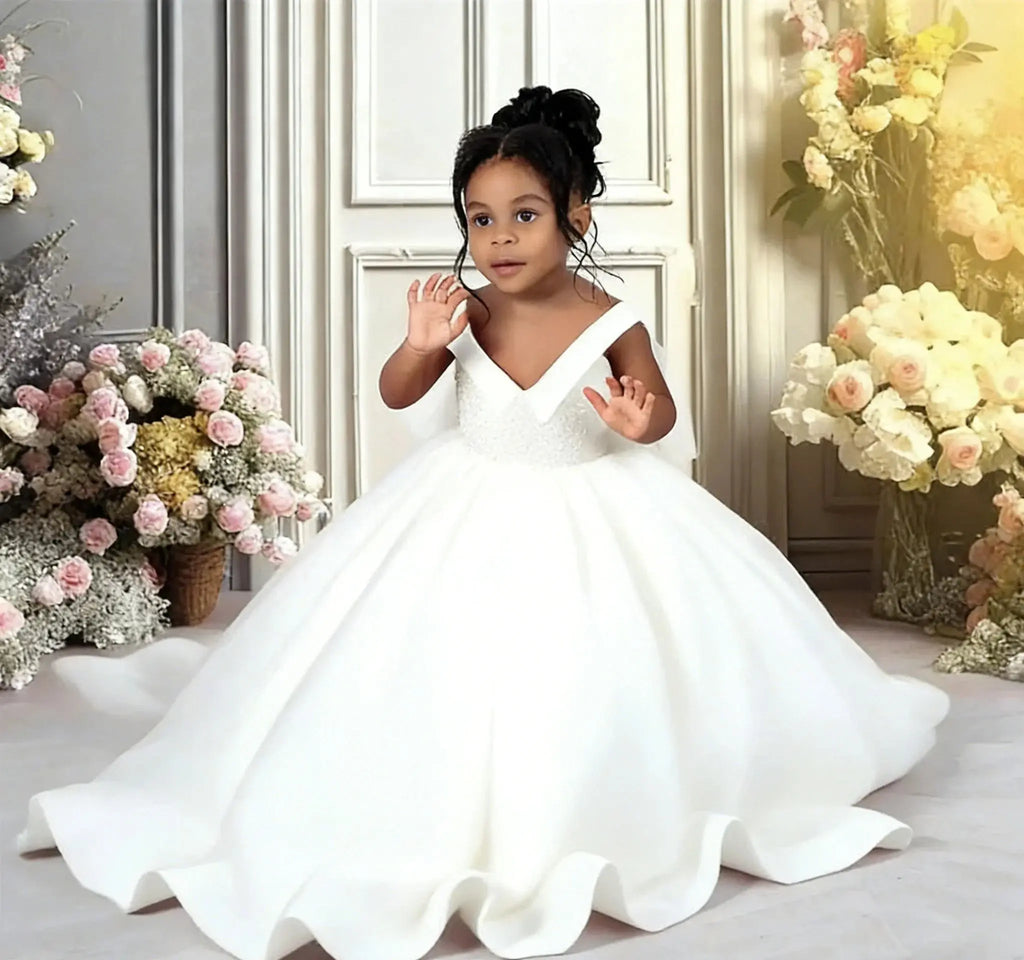 Red satin communion ball gown with a bow, featuring elegant design and flowing skirt, by 1170uf-he.
