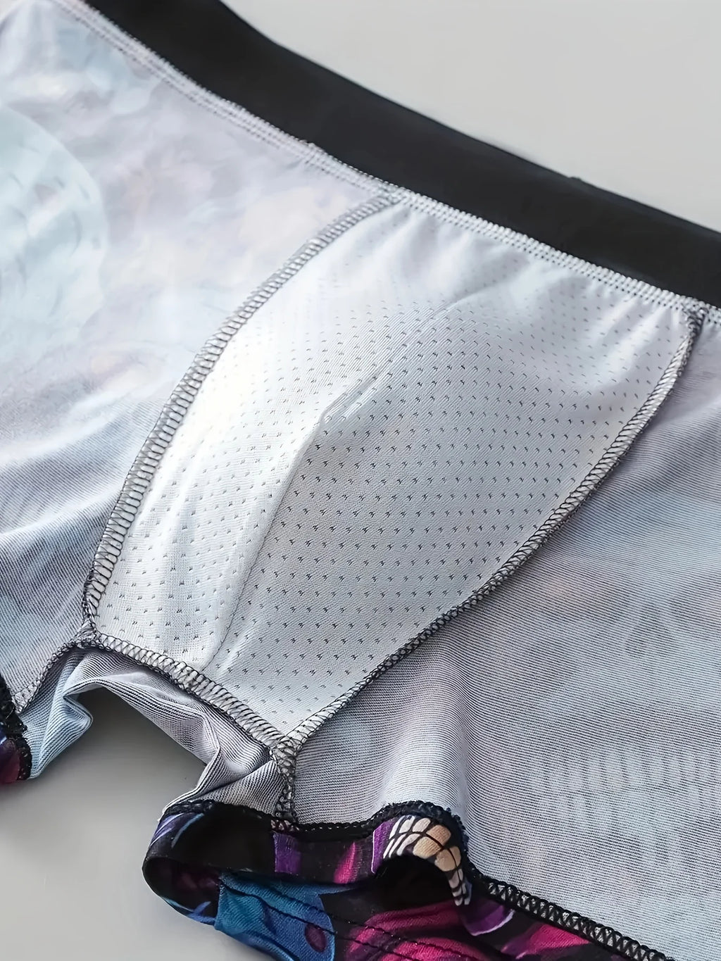 Set of 10 men's printed flat corner underwear by Showlu Fashion, suitable for beach, outdoor swimming, and leisure activities.