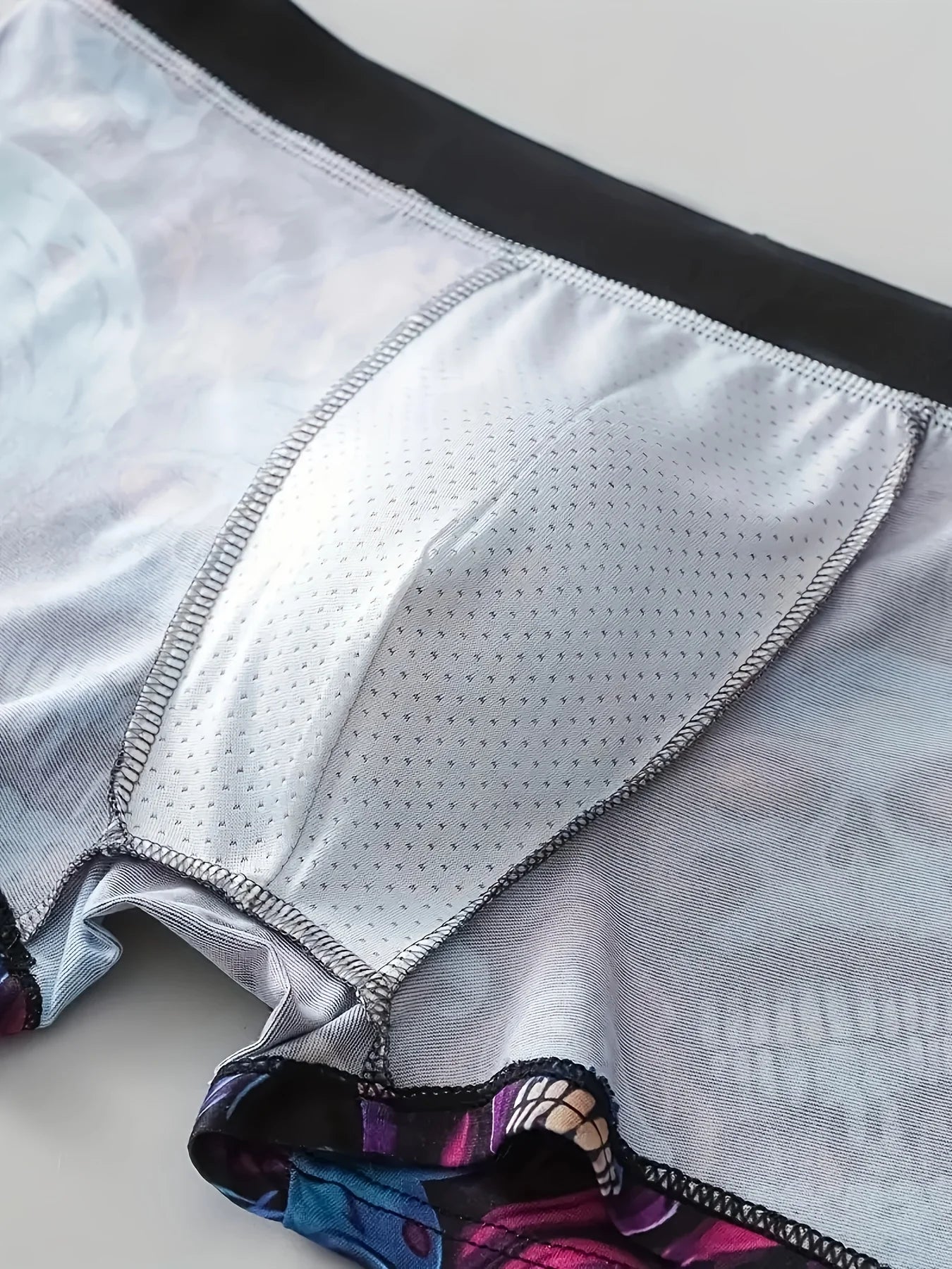 Set of 10 men's printed flat corner underwear by Showlu Fashion, suitable for beach, outdoor swimming, and leisure activities.