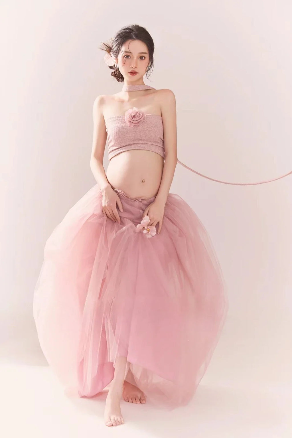 Pink tube top and mesh tutu skirt from Showlu Maternity Photography Outfit, perfect for maternity photoshoots.