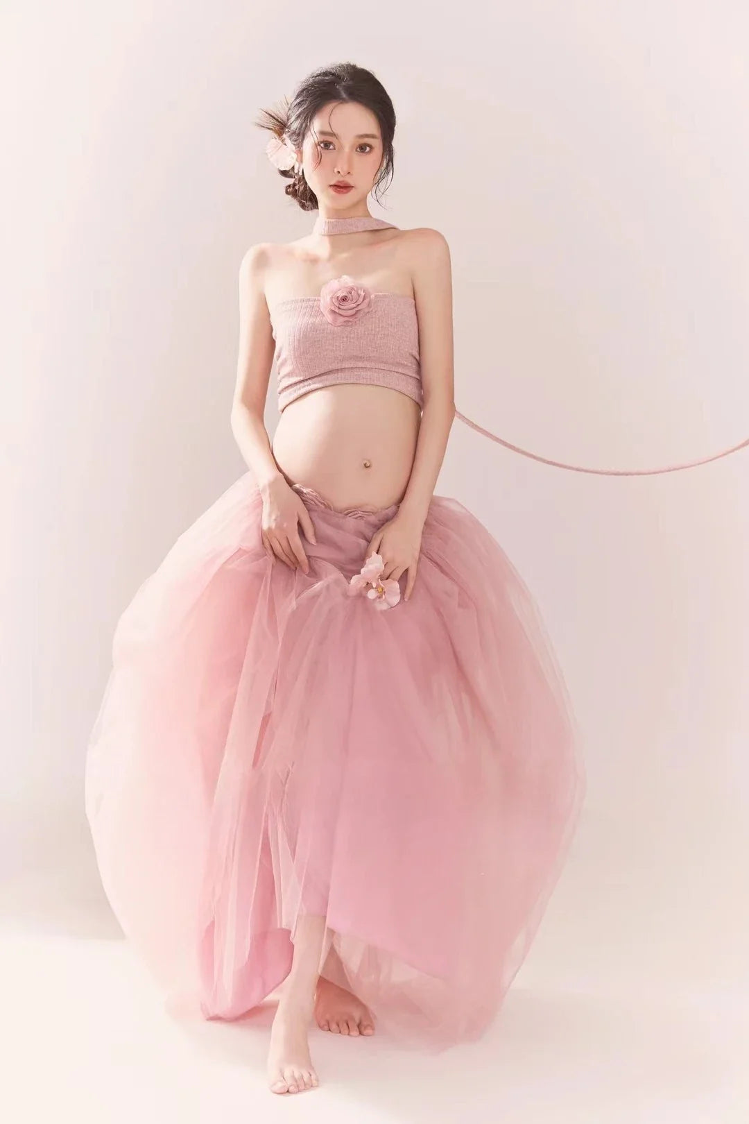 Pink tube top and mesh tutu skirt from Showlu Maternity Photography Outfit, perfect for maternity photoshoots.