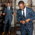 Colorful British-style plaid men's suit set with slim fit blazer and trousers, suitable for formal occasions and business wear.
