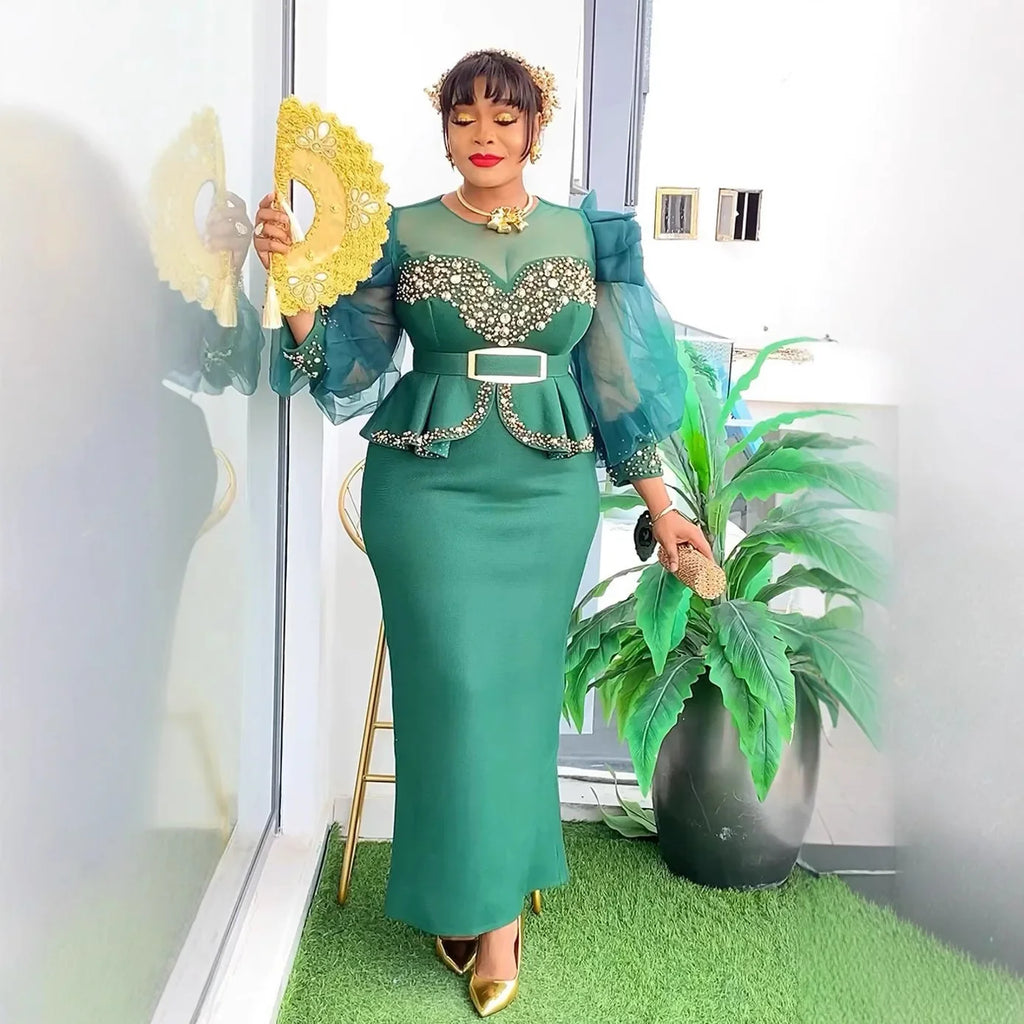 Elegant African dress for women featuring vibrant Dashiki Ankara fabric, long plus size gown for wedding or party occasions.