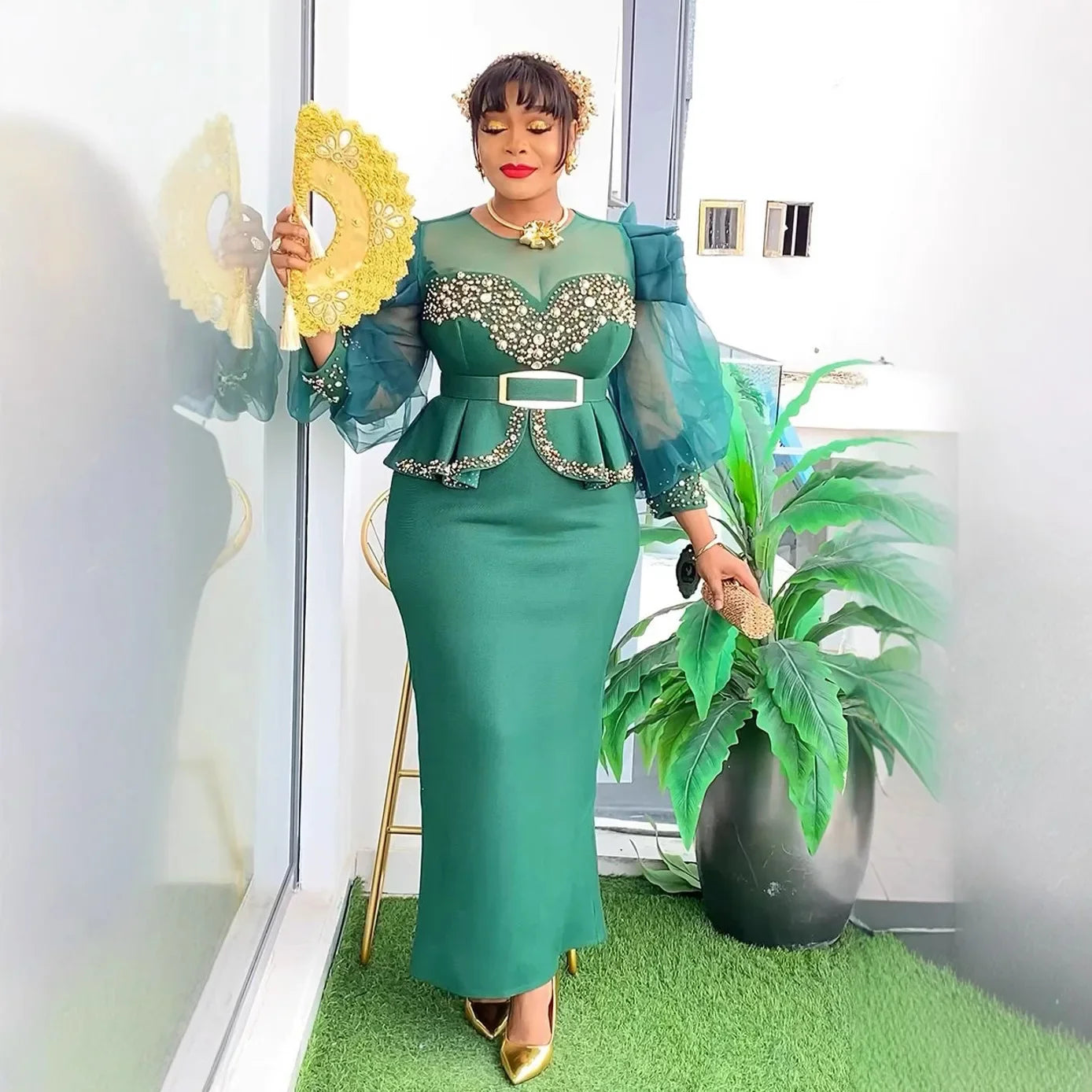 Elegant African dress for women featuring vibrant Dashiki Ankara fabric, long plus size gown for wedding or party occasions.