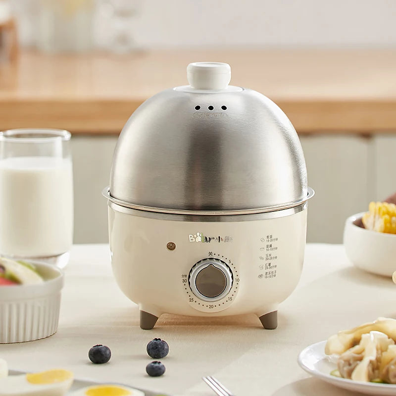 Showlu Smart Electric Egg Boiler in stainless steel, 360W, with timer, capable of cooking 4-6 eggs.